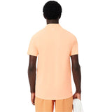 Lacoste Polo Tennis Novak Djokovic On Court Heren Oranje Achterkant