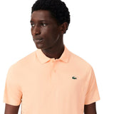 Lacoste Polo Tennis Novak Djokovic On Court Heren Oranje Dichtbij